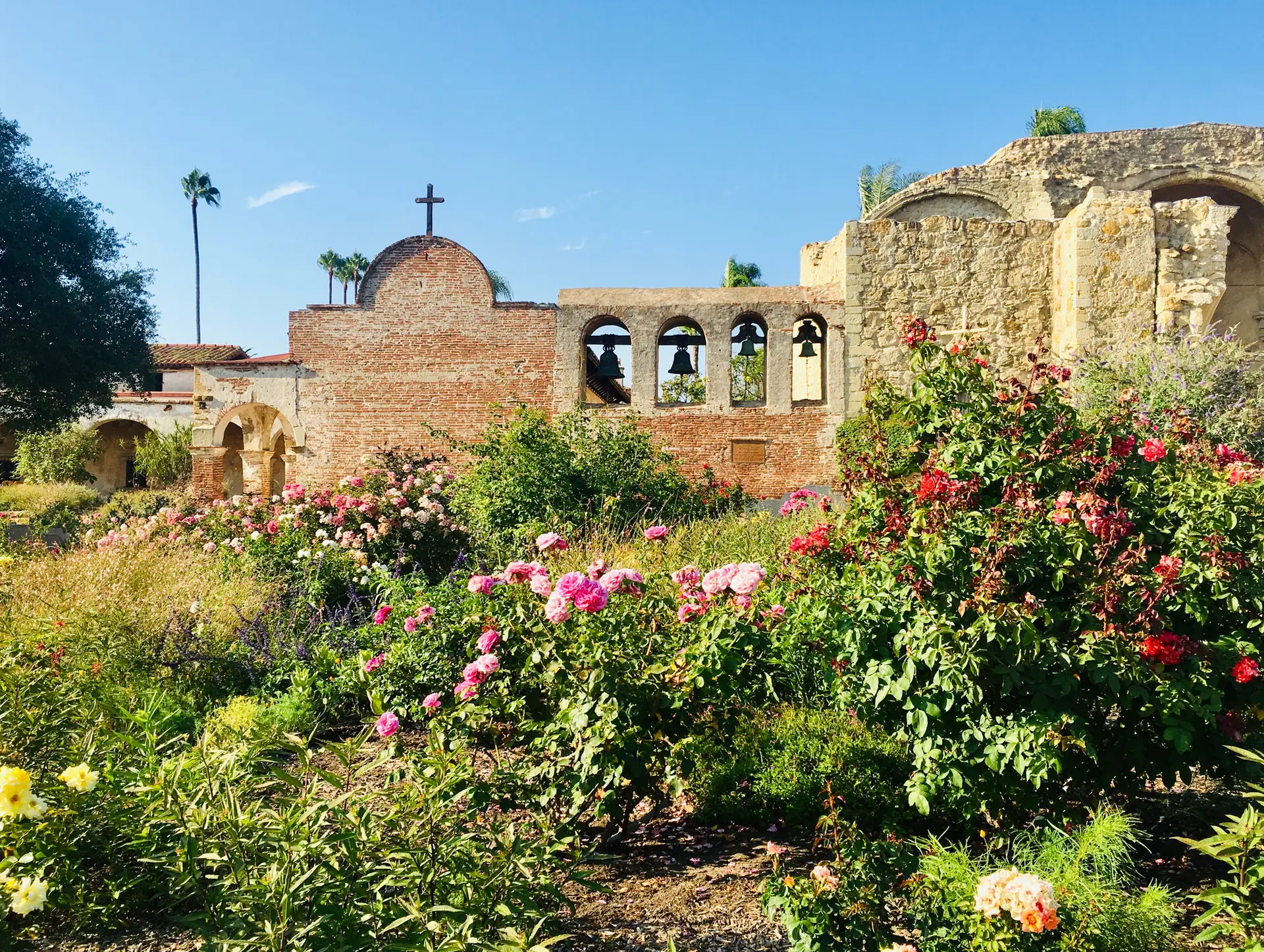 Flowers in front of San Juan Capistrano mission